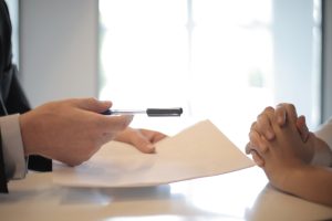 person with papers